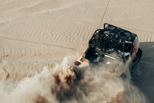 black and white car on desert