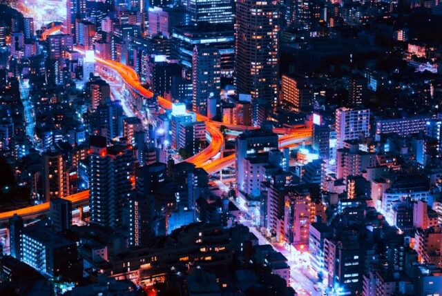 timelapse photography of vehicles and buildings