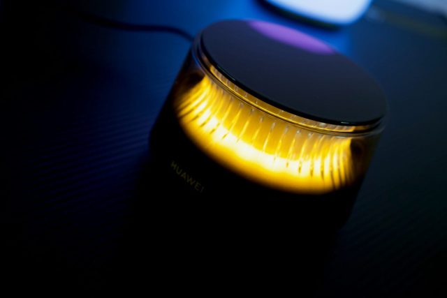 A glowing cylindrical object with yellow light